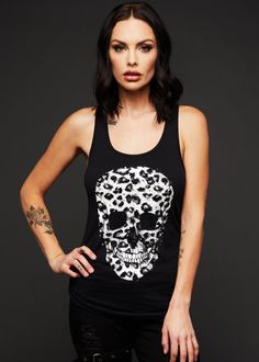 Match made in heaven! A leopard print skull on a black tee? Yes, please! The rock 'n' roll attitude of this sleeveless t-shirt will have you ready to hit the road in style! Versatile, edgy and comfy, that's the spirit behind this rad tank top! The black top features a beautiful leopard print skull design in the front. The lightweight tank top is fabricated from supersoft 60% cotton and 40% polyester, has a very comfortable slightly loose fit cut and a racerback cut back. Available in sizes S, M, Leopard Skull, Skull Tank Top, Black Lace Choker, Gothic Tops, Attitude Clothing, Skull Tank, Leather Bustier, Dream Outfits, Punk Rock Fashion