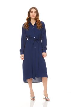 Hi Lo dress. Long sleeves that are easy to adjust. Point collar. Detachable belt. Snap in between buttons. Sizing *Model is 5"8 wearing a size small Fabric 97% Polyester, 3% Spandex Care Fitted Long Sleeve Belted Dress For Daywear, Fitted Button-up Dress With Belt, Blue Belted Button-up Dress, Casual Collared Belted Dress, Fitted Button-up Belted Dress For Daywear, Blue Belted Dress For Work, Blue Belted Button-up Shirt Dress, Blue Dresses With Belted Cuffs, Blue Fitted Dress With Belted Cuffs