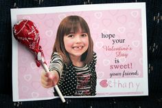 a valentine's day card with a candy lollipop