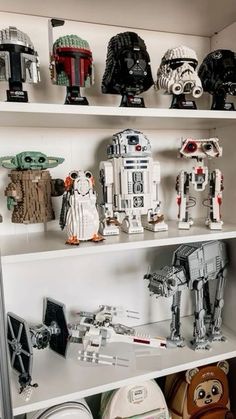 many star wars toys are on shelves in a room