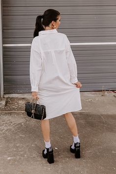 We have no doubt you were born to be stylish, so we know you'll look amazing in this basic white dress! It features lightweight material, a button up front with a collared neckline, long loose sleeves, and a relaxed silhouette that falls into a rounded mid-thigh length hemline! Measurements S : Bust 50", Hip 50", Length 40.5", Sleeve Length 19.5", Waist 50". M : Bust 52", Hip 52", Length 41.5", Sleeve Length 20", Waist 52". L : Bust 54", Hip 54", Length 42", Sleeve Length 20", Waist 54". Basic White Dress, Patent Heels, Loose Sleeves, Button Up Dress, Model Fits, Women Clothing Boutique, Leather Booties, Hip Length, Online Womens Clothing