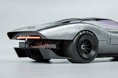 a futuristic looking car is shown in this image