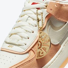 The "Sisterhood" Colorway Is Reminiscent Of A Dreamsicle With Smooth Orange Suede And Creamy Off-White Contrasts. The Shadow Silhouette Is Double The Fun With Abstract Detailing That Features Inverted Tongue Tags, Twin Heel Tabs, Stacked Midsoles, And Double Swooshes. The Sneaker Is Complete With A Gold "Sister" Keychain On The Laces, That Corresponds With The Print On The Insole. The "Sister" Emblem Comes As A Half-Circle, So You Can Pair The Keychain With Friends And Complete The Circle To Say "Sister-Sister." 10.5 Womens Excellent Condition, Used Once For Modeling Purpose Nike Af1 Shadow, Nike Air Force 1 Shadow, Air Force 1 Shadow, Nike Shoes Women, Nike Store, Gold Orange, Cream And Gold, Shoes Nike, Nike Air Force 1