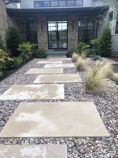 a stone walkway leading to a building