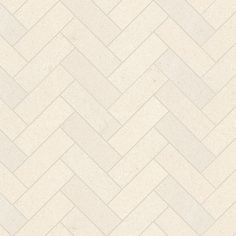 an image of a white herringbone tile pattern