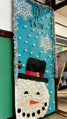 a bulletin board with a snowman on it