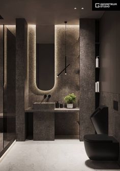 a modern bathroom with black and white decor