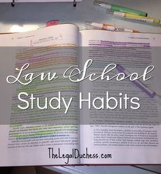 an open book with the words law school study habitts on it and two pens next to it