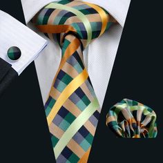 Treat yourself with a new pattern and splash of color to your look with this unique tie set. 100% Silk Handmade Package Includes: Tie, Pocket Square, Cufflinks & Crystal Brooches. Length: 59" Width: 3.34" Warm iron if needed We offer FREE International Shipping World Wide! Necktie Set, Unique Ties, Tie Gifts, Cufflink Set, Cool Ties, Orange Plaid, Man Set, Yellow Plaid, Crystal Brooch