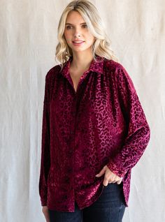 Stay on-trend and unleash your wild side with our Kay Velvet Leopard Print Top! This stylishly fierce top is made from velvet, with a classic collared neck, shirred back, and flowing long sleeves. A classic button down with personality. As perfect for a night out as it is for the office! True to size with a flowy body. 59% POLYESTER 30% NYLON 11% SPANDEX