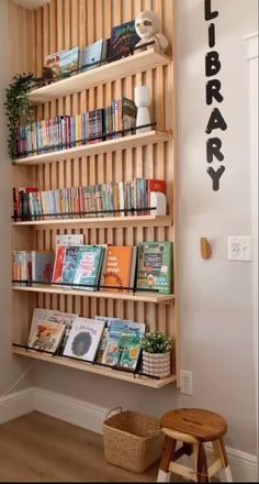 a wooden book shelf with books on it