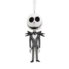 a skeleton ornament hanging from a string