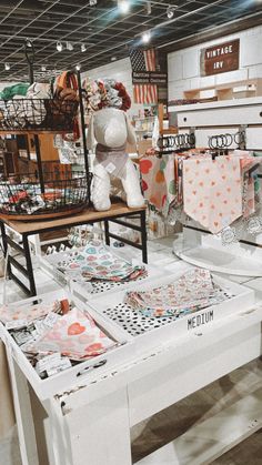 a room filled with lots of different types of items on tables and chairs next to each other