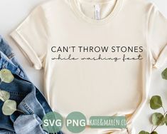 a t - shirt that says can't throw stones while walking past