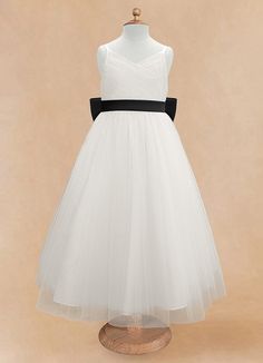 Lea is the perfect dress for any flower girl. Layers of tulle offer a charming aesthetic accompanied by hand sewn pearls safely nestled under the tulle for a hint a sparkle. Fitted First Communion Dress With Tulle Skirt, Sleeveless Black Tulle Princess Dress, Elegant Spring Tutu Dress For Confirmation, Organza Tutu Dress With Tulle Skirt For First Communion, Fitted Tulle Tutu Dress For Confirmation, Elegant Tulle Tutu Dress For Confirmation, Elegant Sleeveless First Communion Dress With Tulle, Tulle Princess Dress For Confirmation, First Communion Tulle Dress For Spring