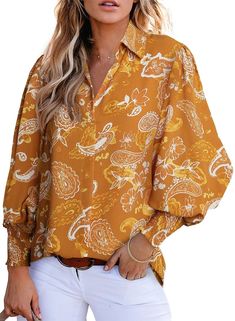 PRICES MAY VARY. V-Neck with Top Button: This 2024 women's balloon sleeves blouse features a V-neck design with a single top button, The only button is at the collar, and the rest of the blouse is stitched closed. The material of the blouse feels silky against the skin. The lantern sleeve detail on this women's shirt adds a fashionable statement.The elastic smocked wrist is comfortable,snug and stretchy for setting a different sleeve length.The sleeves are really nice when you wear them as long Balloon Sleeves Blouse, V Neck Shirts, Oversized Button Down Shirt, Lantern Sleeved Blouses, Trendy Blouses, Shirts Long Sleeve, Women Blouse, Boho Shirts, Blouse Tops