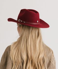 The Dean Western Hat features a pinched crown and a natural mid-length upturned brim with an attached tonal leather band + silver buckle detailing. The Dean is a classic timeless style hat with a touch of modern refinement. Elegant Fedora With Curved Brim For Rodeo, Elegant Brimmed Fedora For Rodeo, Elegant Leather Fedora For Fall, Classic Burgundy Hats For Fall, Elegant Leather Felt Hat For Fall, Elegant Leather Fedora Hat, Elegant Leather Hat For Fall, Chic Wide Brim Leather Hat, Chic Leather Wide Brim Hat