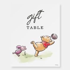 a card with the words gift table and an image of a cat playing with a ball