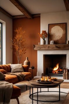 Embrace the warmth of fall with this stunning living room design featuring earthy orange tones, natural wood elements, and a cozy fireplace. Perfect for creating a welcoming and comforting atmosphere, this space blends modern and rustic touches effortlessly. Terracotta Living Room, Burnt Orange Living Room, Burnt Orange Decor, Autumn Living Room, Earthy Living Room, Orange Rooms, Cosy Interior, Fall Living Room, Living Room Warm