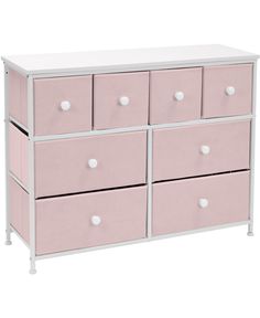 a white and pink dresser with six drawers