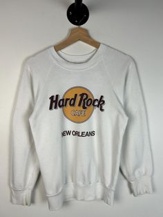 Condition Minor Marks On Sleeves And Back As Shown In Photos. All items are vintage or used so general wear signs are possible. Measurements Pit to Pit: 17" Length: 25" Size Tag: S Any questions? Feel free to shoot us a message! We ship within 1-2 days of purchase. **ALL SALES ARE FINAL** Hard Rock Cafe Sweater, Hard Rock Café, Mens Sweaters, White Crewneck, Hard Rock Cafe, Mens Jumpers, Hard Rock, Size Tag, New Orleans