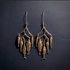 Description Large and absolutely fabulous Vintage style fish and branch statement earrings, with three-dimensional fish charms in a matte gold tone metal that dangle and clink together delightfully as you move around. Everything is SUPER detailed, and they’re surpringly light for their size and quality. Very fishy, very unique and very cool! ✔ Hook closure, very detailed and very high quality✔ Materials: zinc alloy✔ Length approx 11 cm/4.3 inches Shipping • Free shipping worldwide• Tracking incl Nordic Noir, Golden Chandelier, Chandelier Large, Large Statement Earrings, Absolutely Fabulous, Matte Gold, Gold Tone Metal, Three Dimensional