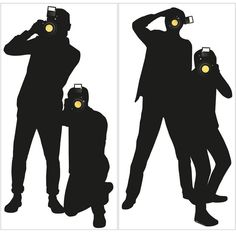 two silhouettes of people with cameras on their heads