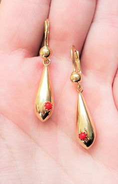 "Vintage drop earrings with Coral stone. Details: Weight: 4.8 grams Style: Dangle Primary Stone: Coral Stone Shape: Round Drop Length: Appx. 1 1/2\" Closure: Lever Back Origin: Italy Metal: 14k Yellow Gold Condition: Previously worn/great condition The back of each earring is stamped with '14k'. All pieces are polished and refinished in our shop. PACKAGING: Each item comes in a jewelry box and wrapped beautifully as a gift. If you would like us to include a gift note in the parcel, please leave Shop Packaging, Small Earrings Gold, Vintage Drop Earrings, Gold Jewelry Simple Necklace, Back Drop, Gold Jewelry Simple, Coral Stone, Vintage Jewels, Small Earrings