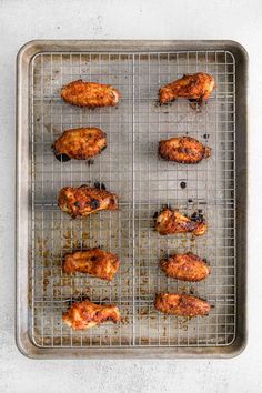 chicken wings on a baking tray ready to be cooked