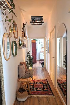 the hallway is clean and ready for us to use as an entrance way in this home