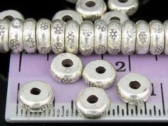 Thai Karen hill tribe Silver White color daisy print space bead Weight 5.7 grams Size : 6.0 x 2.0 mm. Lot of 8 beads Material : 97% silver content Item# KK-017 Traditional Silver Round Beads, Silver Spacer Beads Round Shape, Hill Tribe Silver, Beaded Material, Daisy Print, Spacer Beads, White Color, Thailand, Daisy