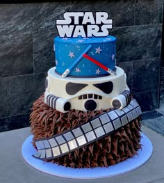 a star wars themed cake on top of a blue plate