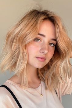 Are you ready to ignite your style and turn heads wherever you go? Look no further than the captivating allure of strawberry blonde hair. This enchanting shade, a perfect blend of red and golden hues, Blonde Shades