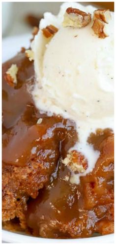 a close up of a plate of food with mashed potatoes and gravy