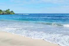 the beach is clean and ready to be used for swimming or playing in the water