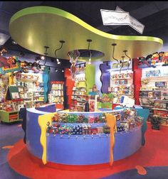 the toy store is brightly decorated with toys