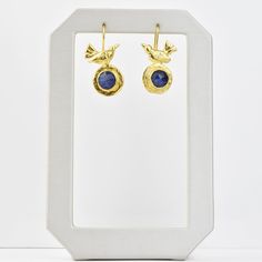 Handmade in Turkey Gold plated over brass Bezel set ruby or lapis Earrings measure about 1.25" long French ear wire with hook closure Click HERE to see more jewelry from AJS Design Goldmakers Jewelry Mission Statement Goldmakers Jewelry creates and curates a comprehensive selection of artfully designed hand-crafted jewelry. We aspire to offer the jewelry enthusiast access to affordable classics as well as fresh innovative designs. Gold Lapis Lazuli Pierced Earrings, Gold Pierced Earrings With Lapis Lazuli, Gold Lapis Lazuli Earrings, Gold Lapis Lazuli Drop Earrings, Gold Lapis Lazuli Pierced Jewelry, Gold Lapis Lazuli Jewelry, Handmade Gold Lapis Lazuli Earrings, Gold Lapis Lazuli Earrings As Gift, Gold Lapis Lazuli Earrings For Gift