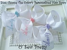 three white bows with the words you choose the colors personalized hair bows