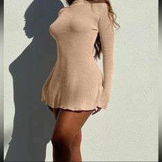 Cute Backless Dress With A Little Cute Sparkle Can Dress Up Or Down! Beige Long Sleeve Stretch Mini Dress, Beige Backless Bodycon Dress For Spring, Backless Beige Mini Dress For Spring, Beige Backless Mini Dress For Spring, Long Sleeve Bodycon Mini Dress For Beach, Flirty Stretch Mini Dress For Fall, Stretch Mini Dress For Day Out, Stretch Beige Mini Dress For Day Out, Beige Stretch Mini Dress For Day Out