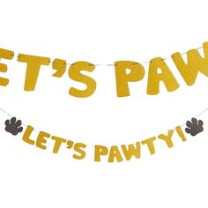 there is a banner that says let's paw and two black paws on it