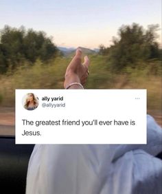 someone holding up a sign that says, the greatest friend you'll ever have is jesus