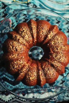 a bundt cake sitting on top of a glass plate