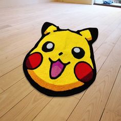 a rug with a pikachu face on it