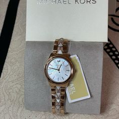 Michael Kors Rose Gold Women’s Watch With Mother Of Pearl Face And Crystal Like Accents New In The Box Retail $275 Timeless Michael Kors Watch As Gift, Michael Kors Timeless Watch As Gift, Michael Kors Round Dial Watch As A Gift, Michael Kors Jewelry With Round Dial For Gifts, Michael Kors Jewelry Gift With Round Dial, Michael Kors Jewelry Gift, Elegant Michael Kors Diamond Watch, Michael Kors Elegant Diamond Watch, Elegant Michael Kors Diamond Watch With Round Dial