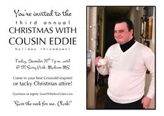 a man in a white shirt and black pants is standing next to a christmas card