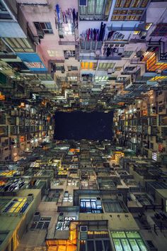 an overhead view of a building with lots of windows and balconies in it