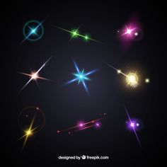 different colored lights on a black background with stars and sparkles in the dark sky