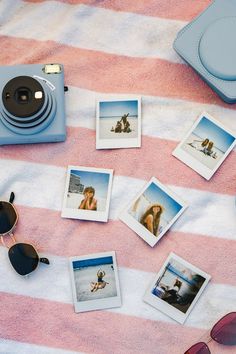 Striped coral and white towel as the background. Polaroids are spaced out on the towel; polaroid pictures are of models wearing various Lotus and Luna beachwear products. Sunglasses and blue polaroid cameras are also on the towel for fun beach aesthetic.