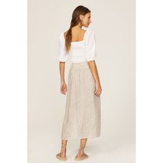 Off-white stripe linen (100% Linen). A-line. Front button closure. 34" from waist  to hemline. Imported. Summer Linen Bottoms With Vertical Stripes, Chic Striped Linen Bottoms, Striped Linen Bottoms For Spring, Striped Linen Bottoms For Day Out, White Linen Lined Skirt, Chic White Linen Skirt, White Linen Skirt For Day Out, White Vertical Stripes Skirt For Summer, White Skirt With Vertical Stripes For Spring