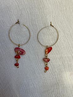 These earrings are handmade with salvaged red choral beads and gold-toned wire and hoops. The are very elegant and unique at the same time.  Earring length: 2 inches Instagram: @bead.brain for more jewelry info and inspo! request trades, custom jewelry or alterations Wire Jewelry With Beads, Red Metal Dangle Beaded Earrings, Red Small Hoop Metal Jewelry, Red Dangle Beaded Metal Earrings, Small Hoop Red Metal Jewelry, Red Dangle Beaded Earrings, Red Metal Beaded Earrings For Pierced Ears, Handmade Red Beaded Hoop Earrings, Red Metal Beaded Drop Earrings